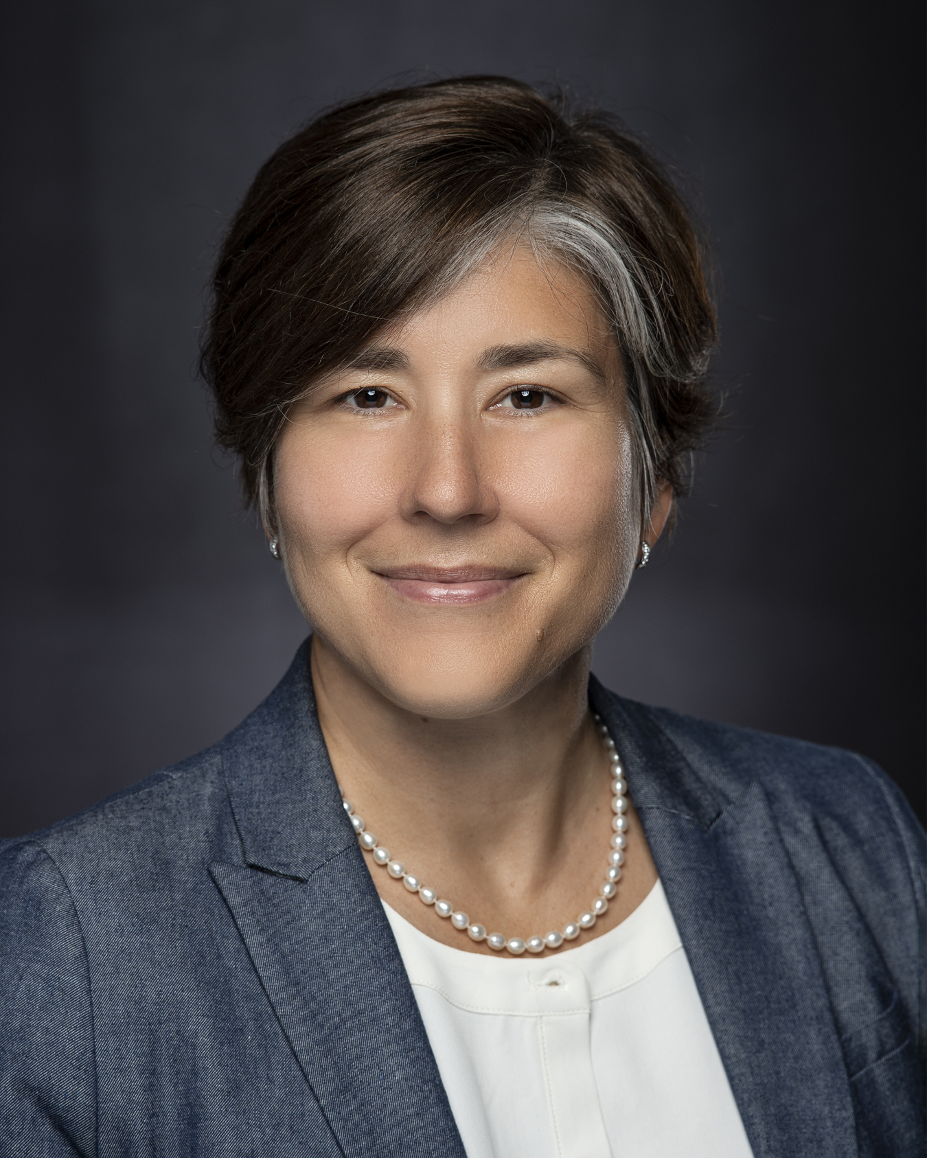 Headshot of MONICA NEUKOMM