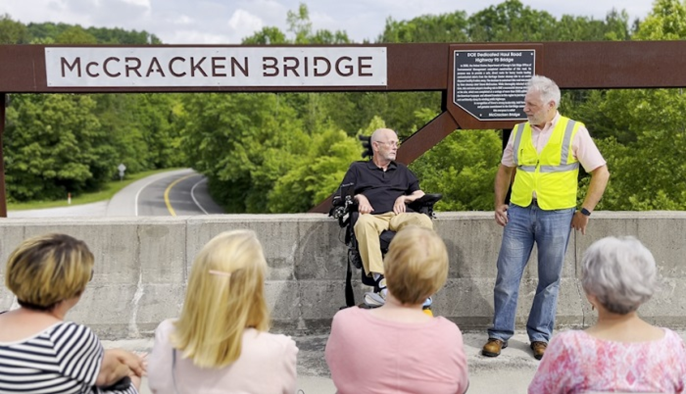 Ken Rueter, president and CEO of Oak Ridge cleanup contractor UCOR, speaks during the McCracken Bridge dedication ceremony about the lasting impact of Steve McCracken’s leadership on the Oak Ridge environmental cleanup program.