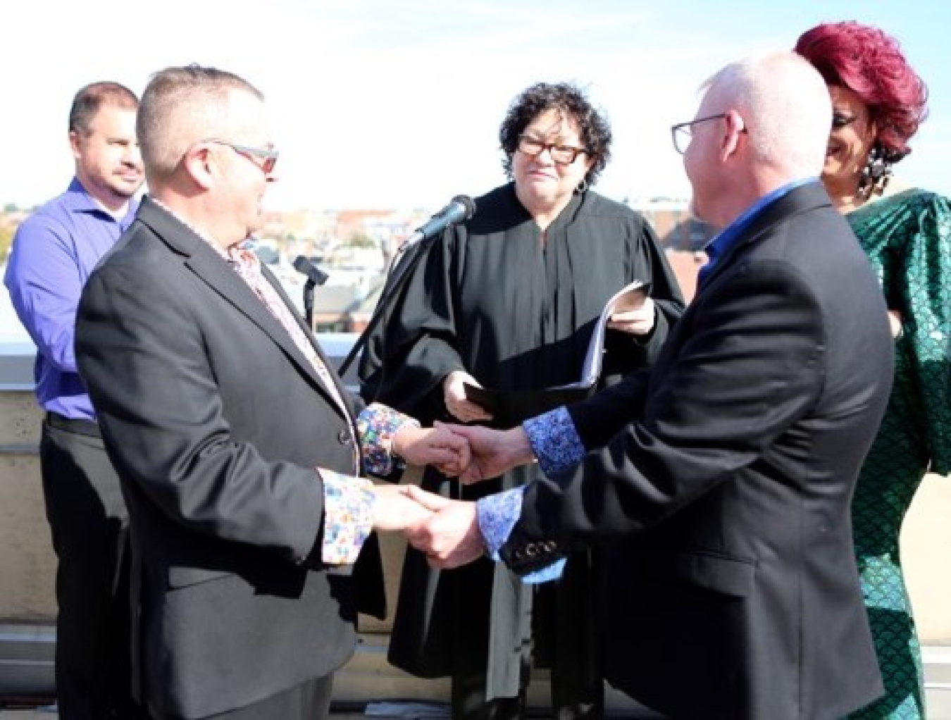 Paul and his husband Sid at their wedding ceremony, officiated by Justice Sonia Sotomayor.