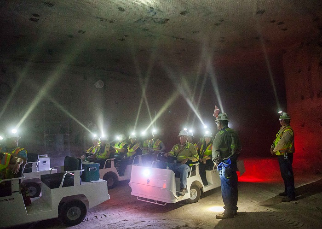 As their headlamp beams pierce the salty air, members of the Energy Communities Alliance get an up-close tour of newly created Panel 8 at the Waste Isolation Pilot Plant. The panel will begin accepting waste in late summer after Panel 7 is filled.