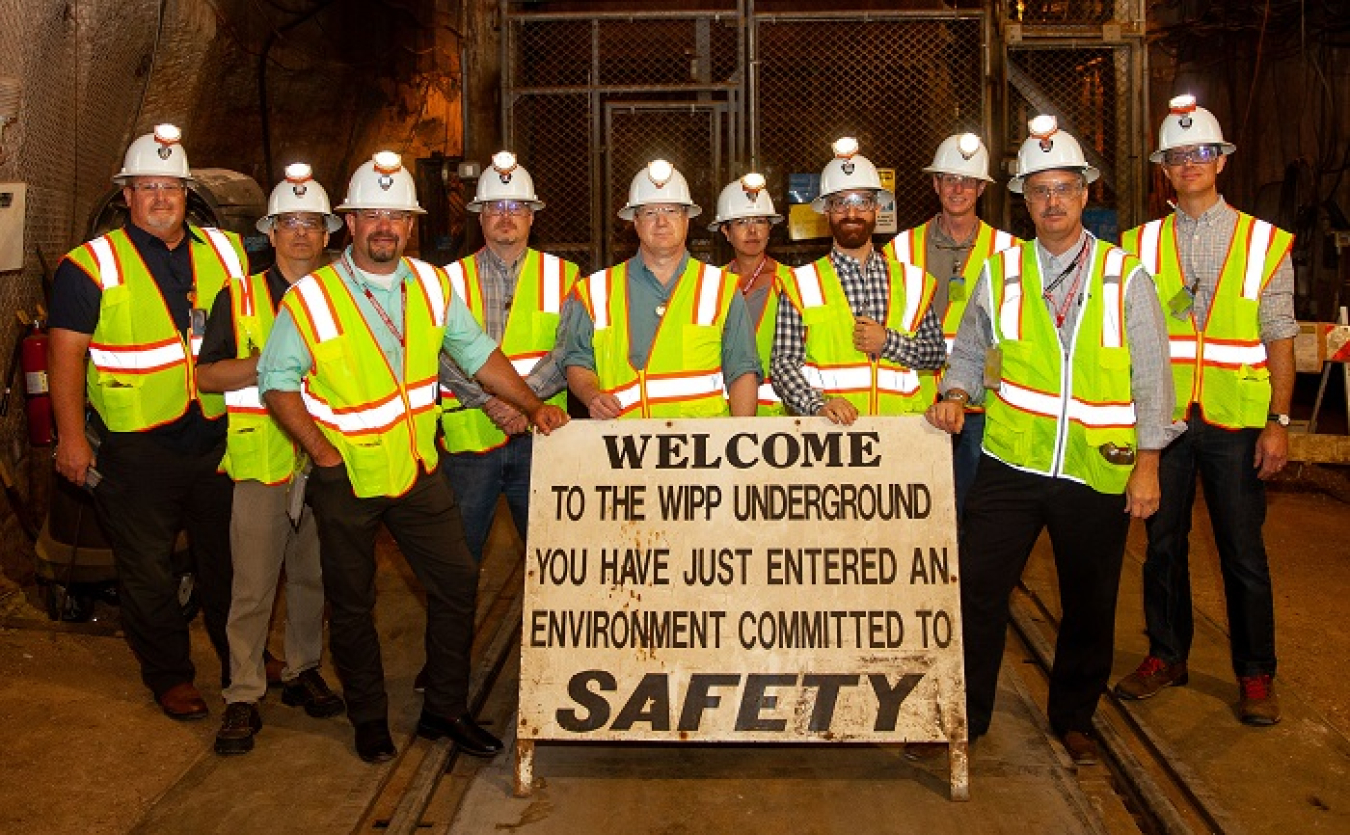 Members of the National Governors Association Federal Facilities Task Force gather upon arrival in the Waste Isolation Pilot Plant underground, 2,150 feet below the New Mexico surface.