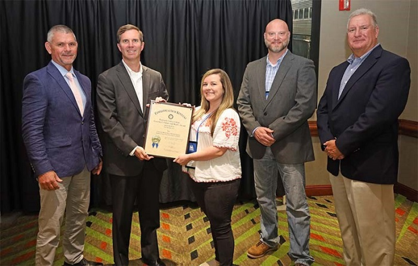 From left, Swift & Staley (SSI) Environment, Safety and Health Manager John Hobbs; Kentucky Gov. Andy Beshear; SSI SAFE Team Chairperson Hailey Wiseman; United Steel Workers Local 550 Safety Representative Jason Gilbert; and Kentucky Labor Cabinet Secretary Jamie Link.