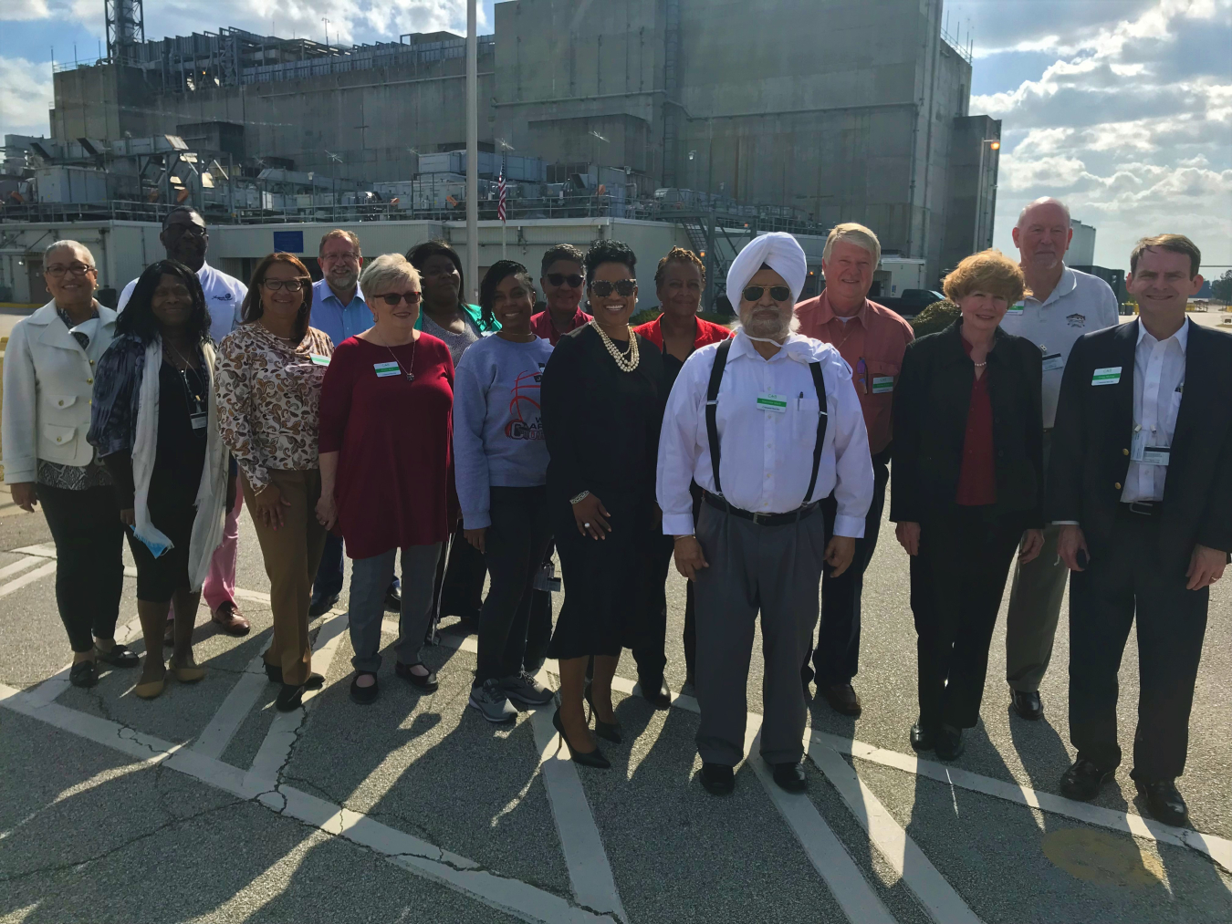 A group of individuals standing for a picture 