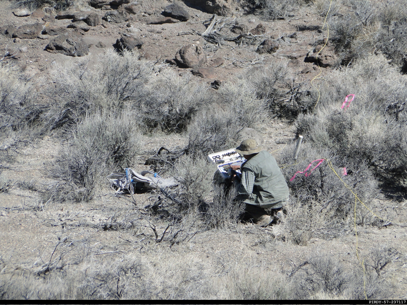 A worker records data received from the EM Nevada Program’s most recent geophysical survey at the fourth of four groundwater characterization areas of a portion of the Pahute Mesa at the Nevada National Security Site.