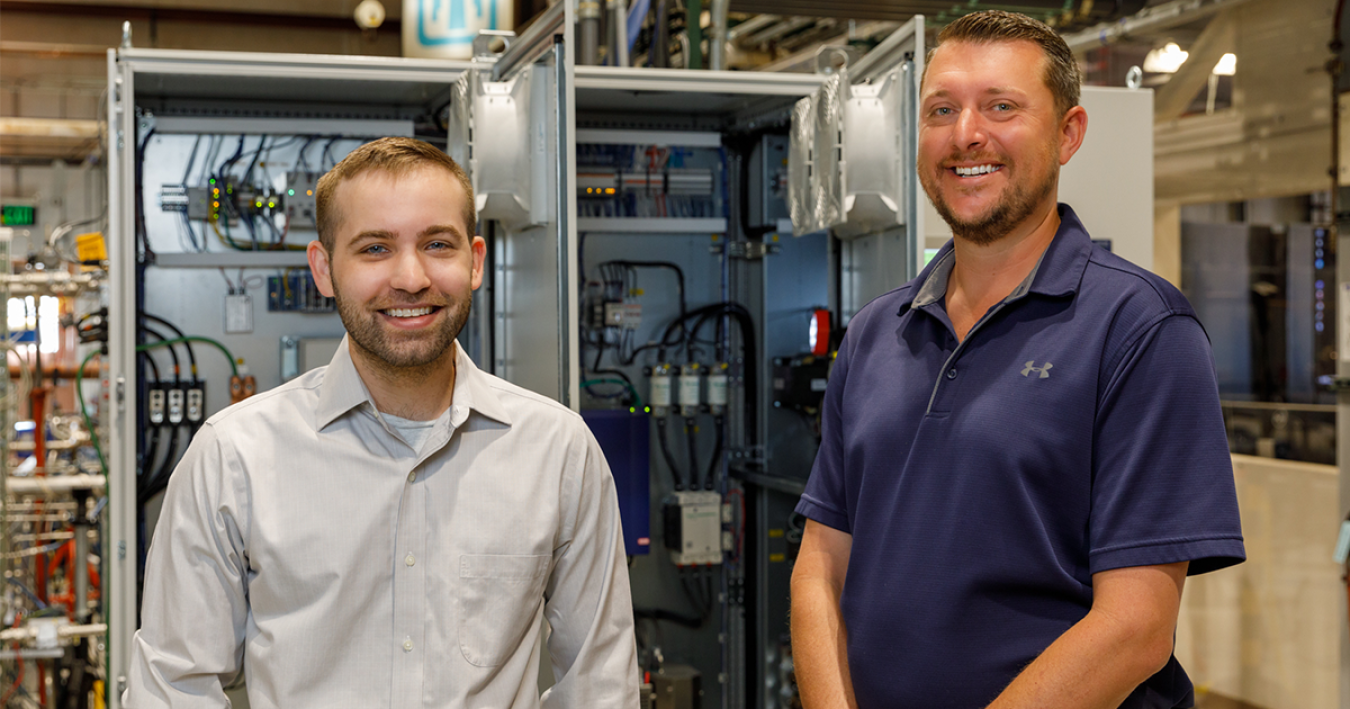 Sandia National Laboratories mechanical engineers Logan Rapp (left) and Darryn Fleming (right) 