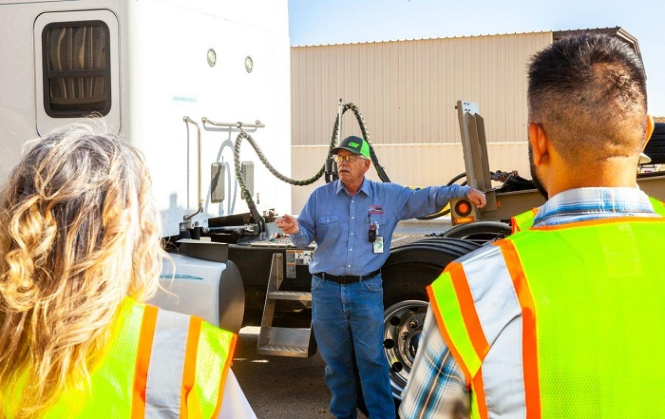 Driver Greg Grimm discusses the trucks used by CAST Specialty Transportation to transport TRUPACT casks containing transuranic waste from generator sites throughout the country to the Waste Isolation Pilot Plant.