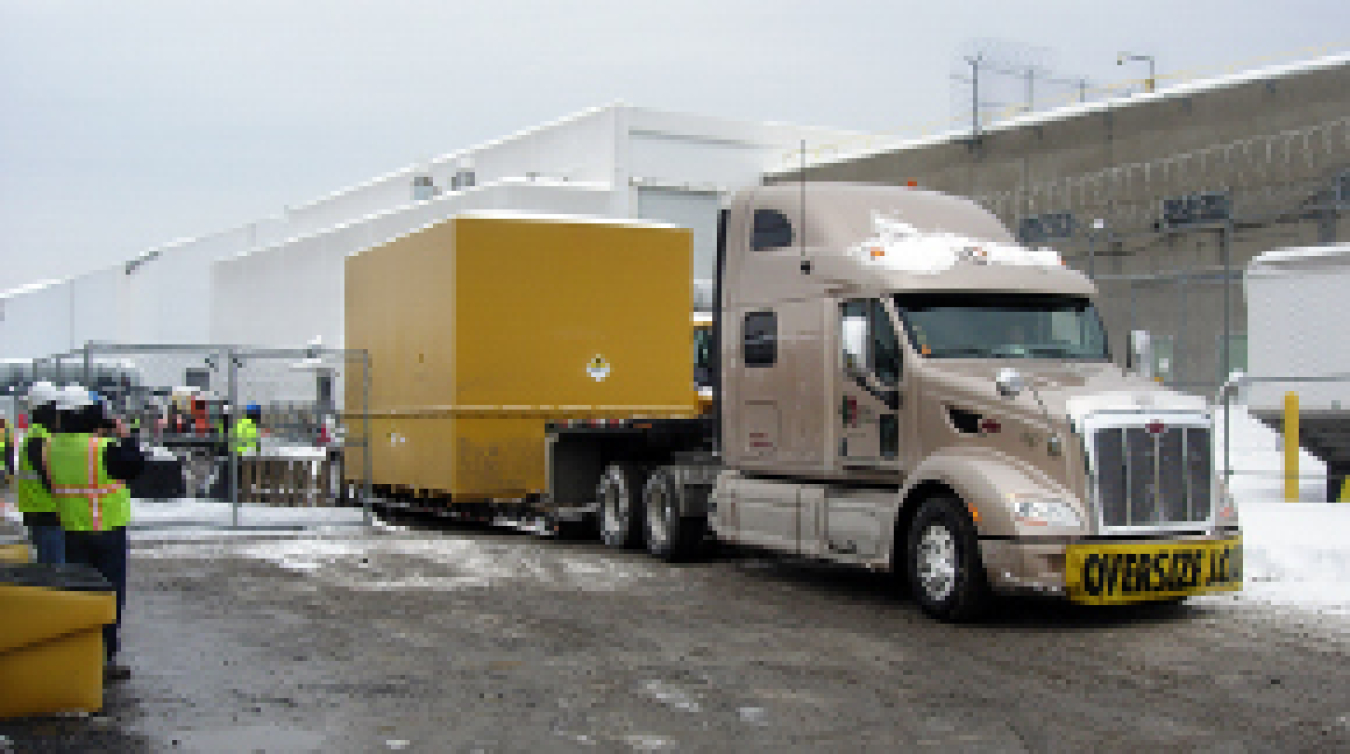 The closed shipping container holding the tank is ready for shipment to the out-of-state disposal facility.