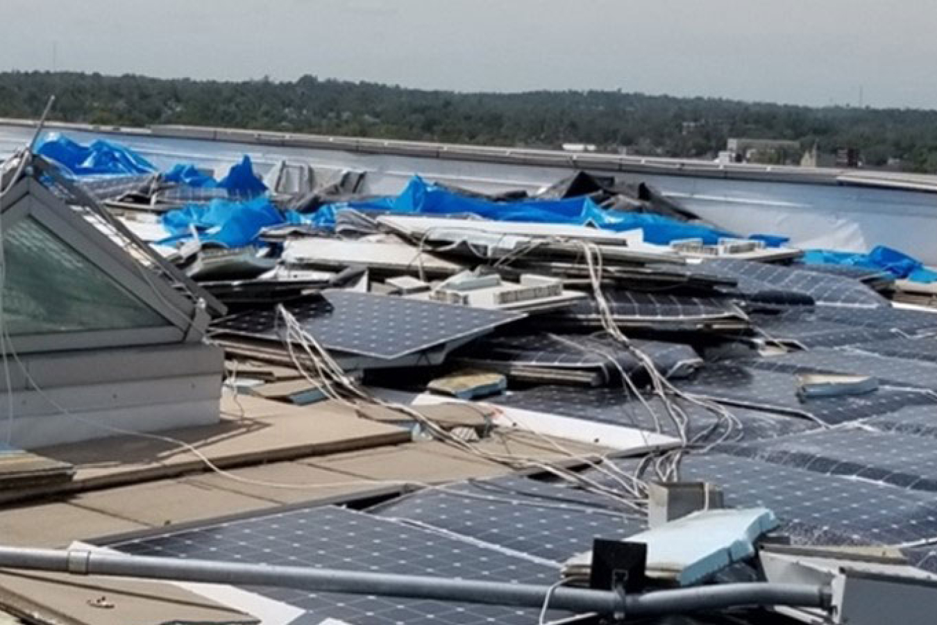 Several solar panels broken due to storm damage.