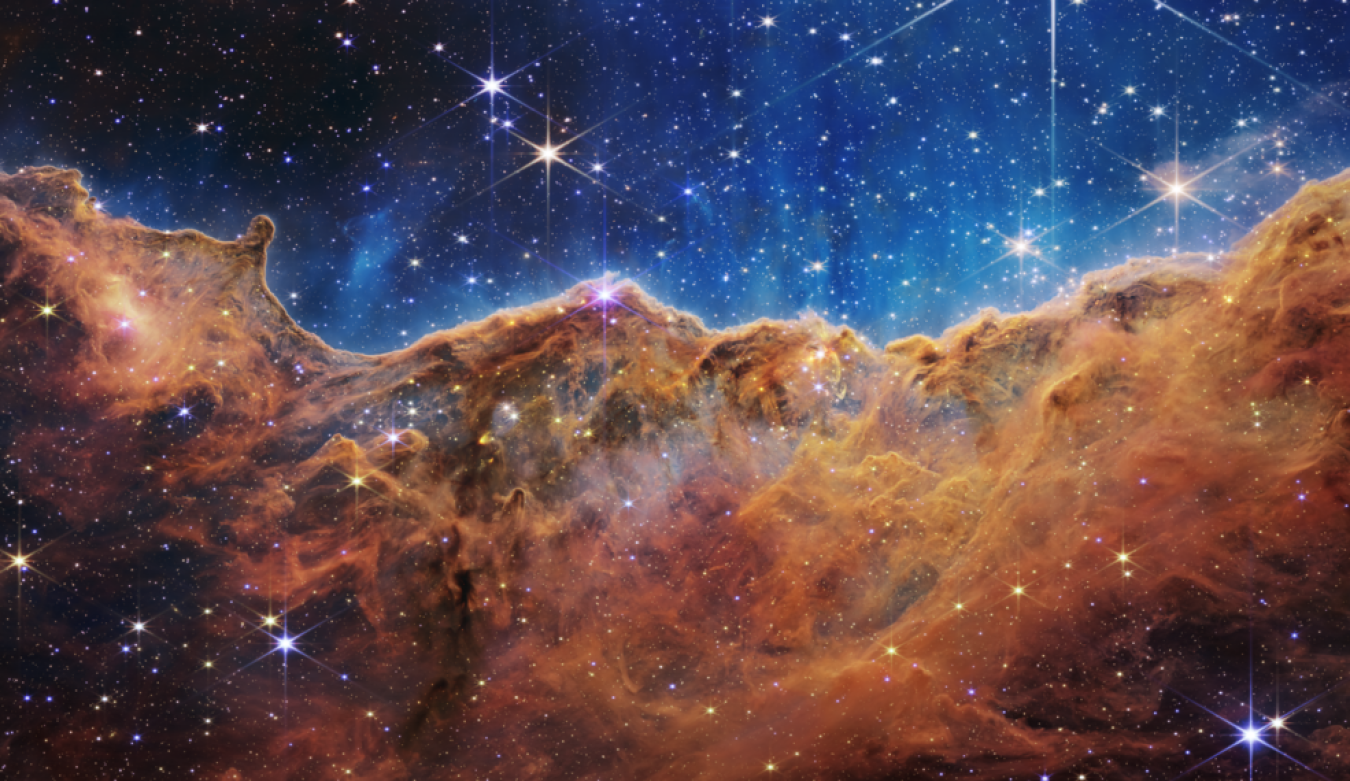 Image of a cloudlike nebula against the stars.