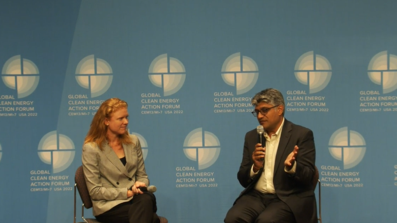 Robyn Beavers and Jigar Shah sitting on stage