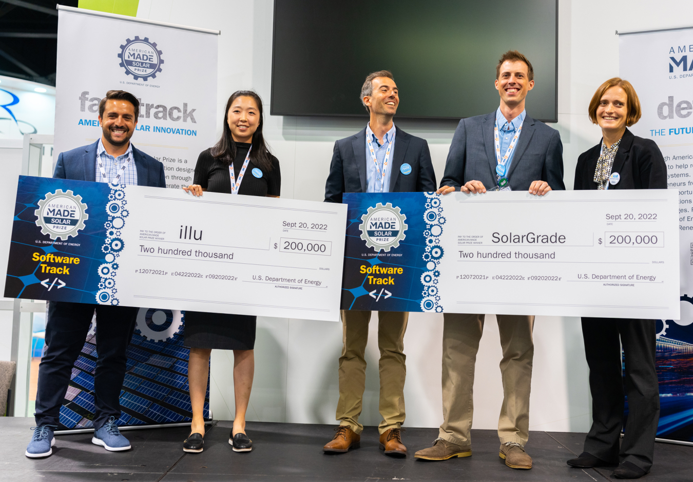 Winners of the Solar Prize Round 5 Software Track are presented with their prizes on stage at the RE+ conference.