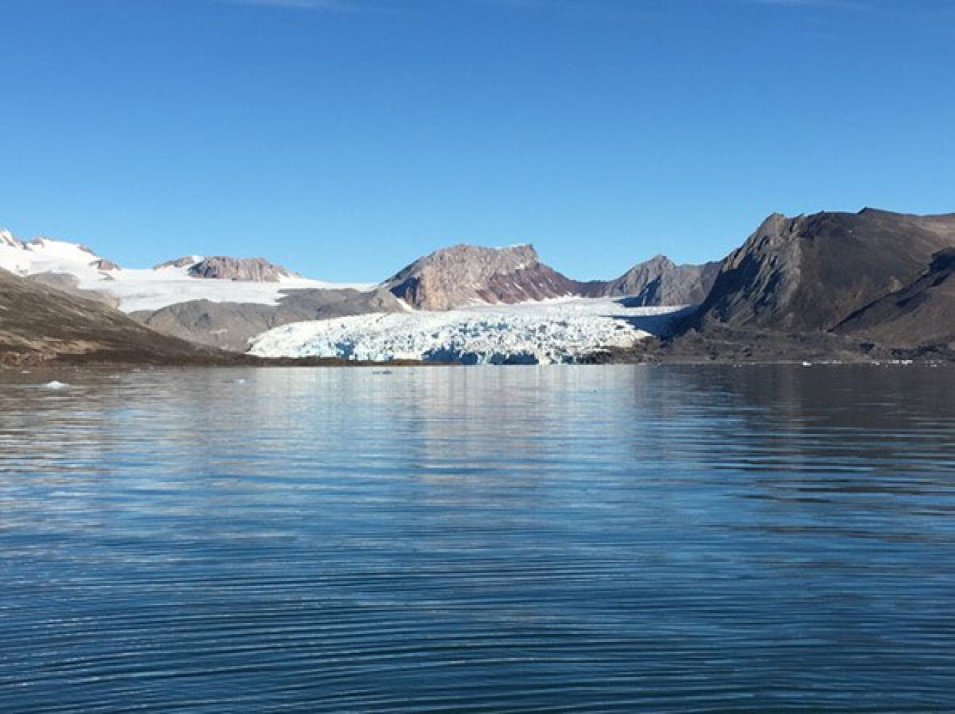 A glacier in Kongsfjorden, Ny Ålesund, Svalbard, Norway, north of the Arctic Circle. New research found that soil microbes in Svalbard are equipped to respond to climate change.