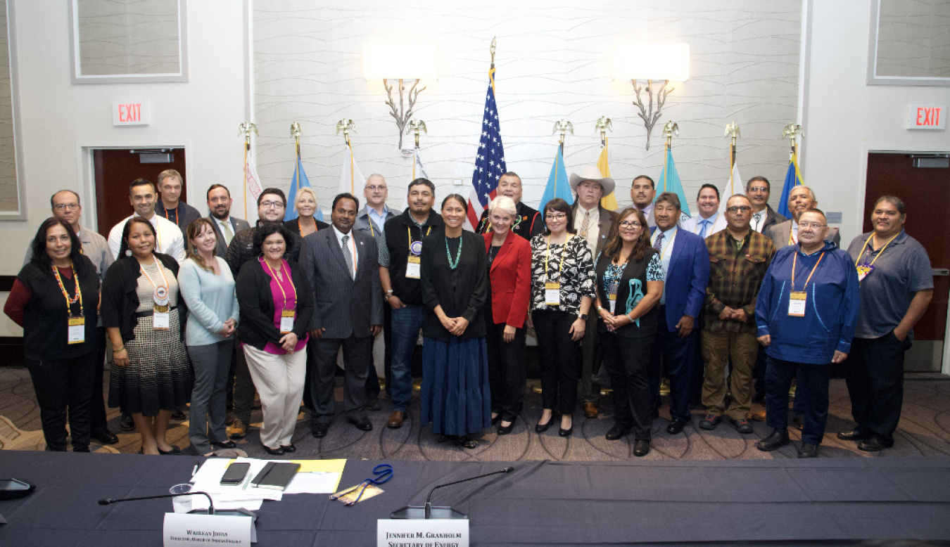 Secretary Jennifer M. Granholm and Office of Indian Energy director Wahleah Johns group photo with Tribal Leaders at the 2022 Tribal Clean Energy Summit in Washington, DC.