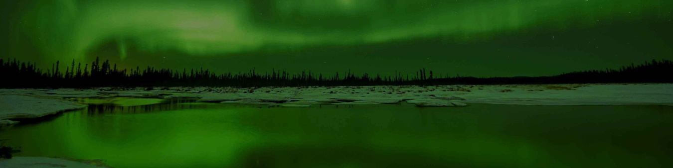 Northern lights over a lake in Fairbanks Alaska