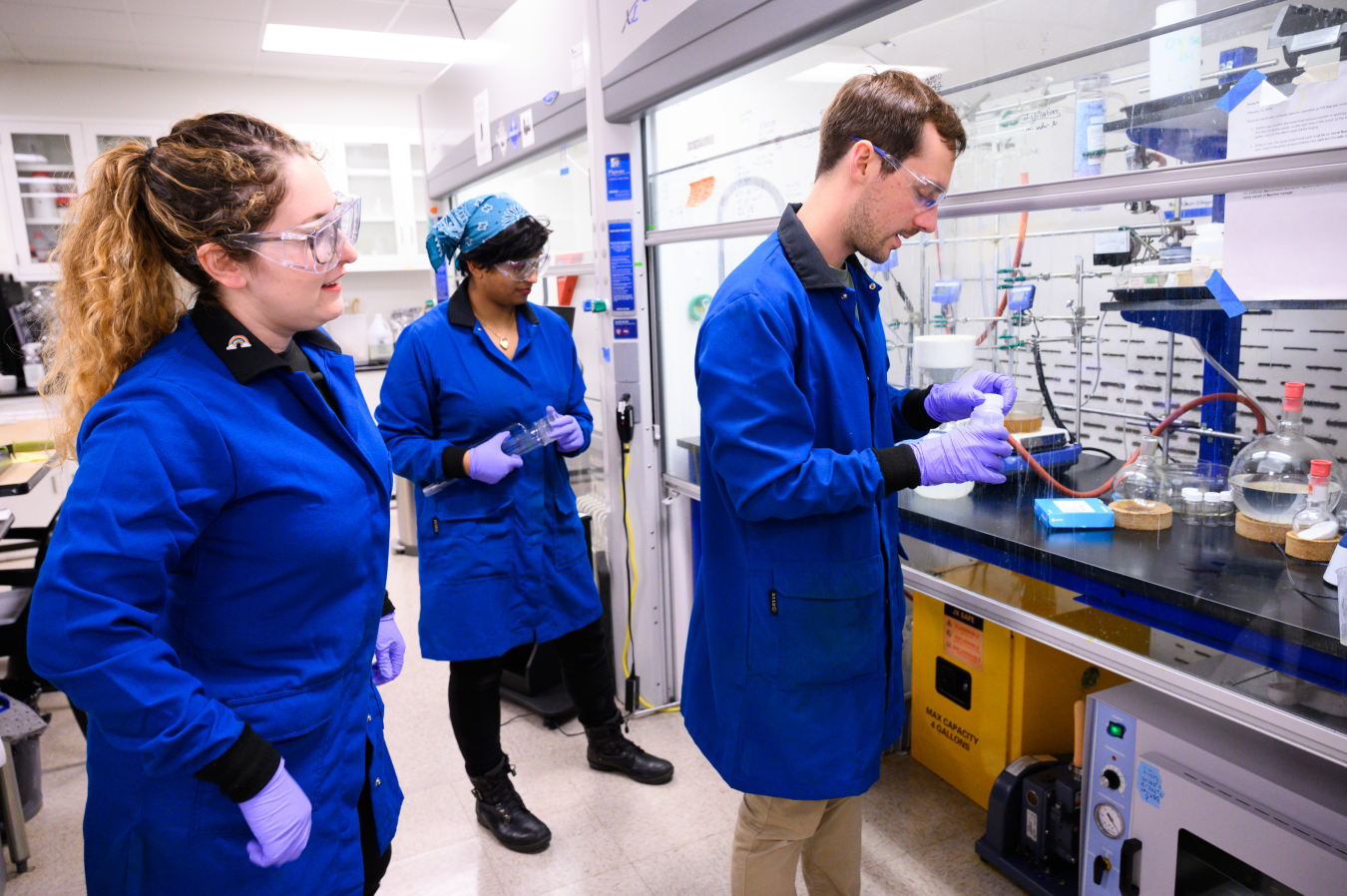 Jessica Golden, Director of R&D - Materials, Vidya Prasad, Research Associate, and Steven Lyle, Staff Scientist, (left to right) preparing to polymerize new membrane materials that stabilize lithium metal anodes for long-range and low-cost electric vehicle batteries.