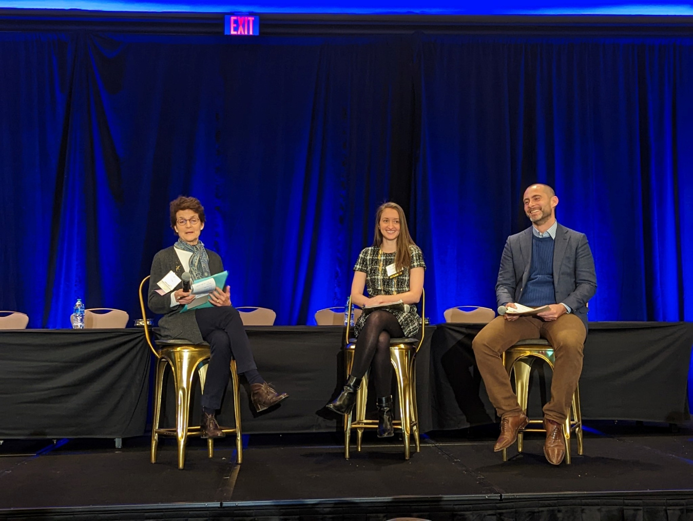 Alejandro Moreno speaks alongside Courtney Fogwell at the 14th biennial Wind Wildlife Research Meeting