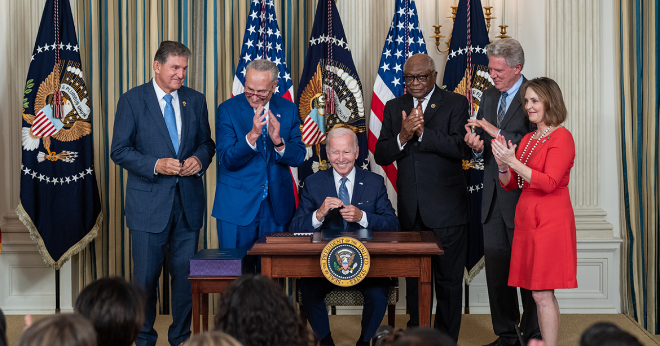 President Joe Biden signs the Inflation Reduction Act into law.