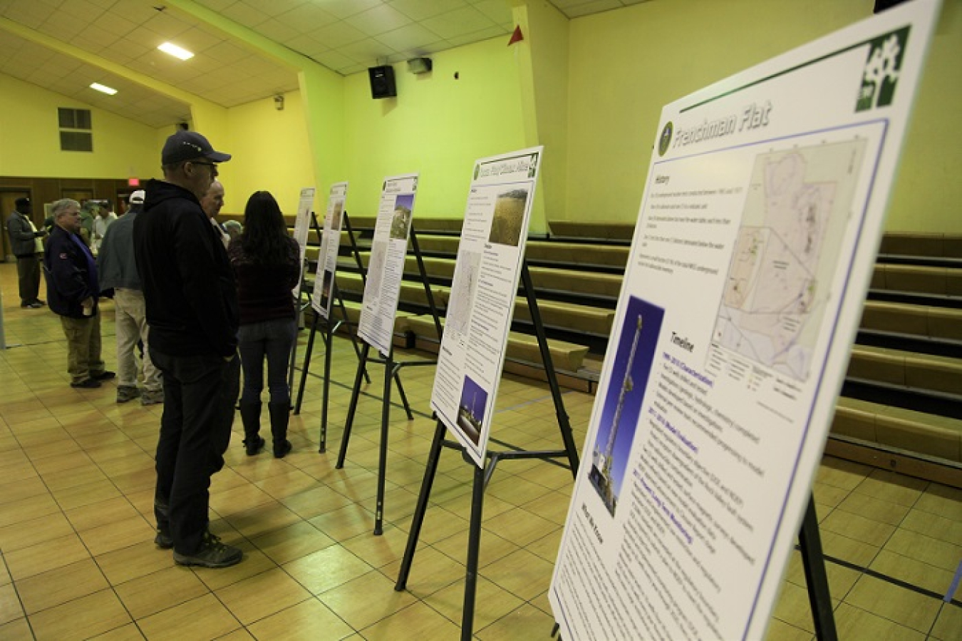 Amargosa Valley, Nevada visitors view displays at the EM Nevada Program Groundwater Open House.