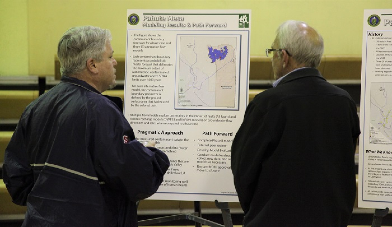 EM Deputy Program Manager Bill Wilborn, left, talks with a resident during the Groundwater Open House. 