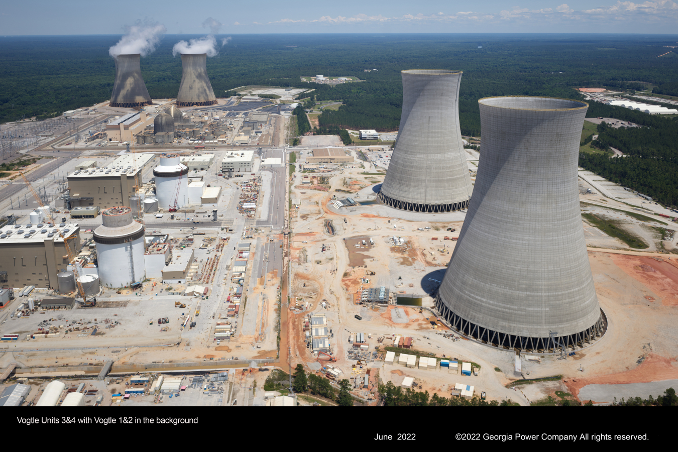 Photo of Vogtle Units 3 & 4 with Vogtle 1 & 2 in the background. Credited to George Power Company.