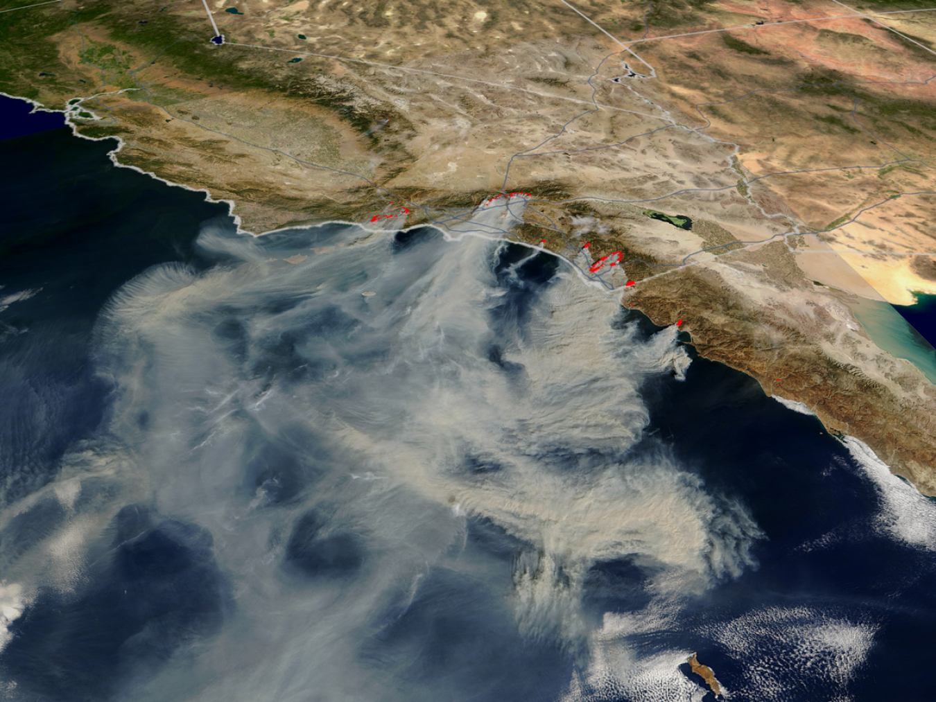 Satellite image of the 2003 wildfires in southern California that spurred San Pasqual's journey toward energy resilience.