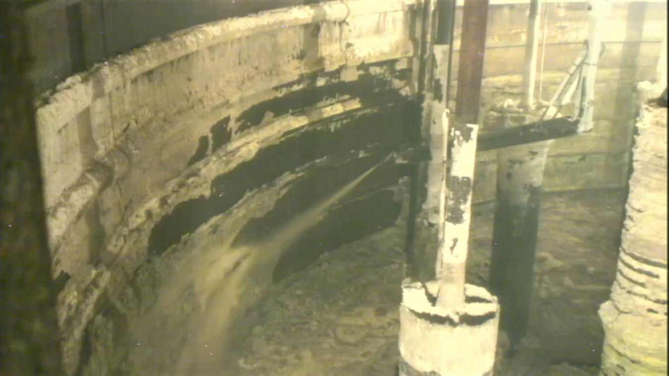 The water stream from one of three sluicers installed in AX-101 on the Hanford Site is used to remove waste from tank walls during retrieval operations.