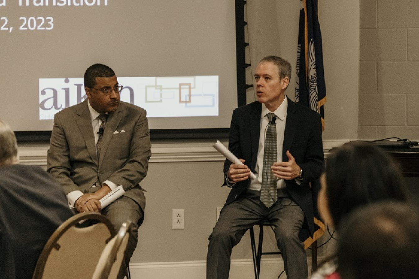 EM Senior Advisor William "Ike" White, right, speaks during a broadly attended community breakfast held by Citizens for Nuclear Technology Awareness, as National Nuclear Security Administration Principal Deputy Administrator Frank Rose listens.