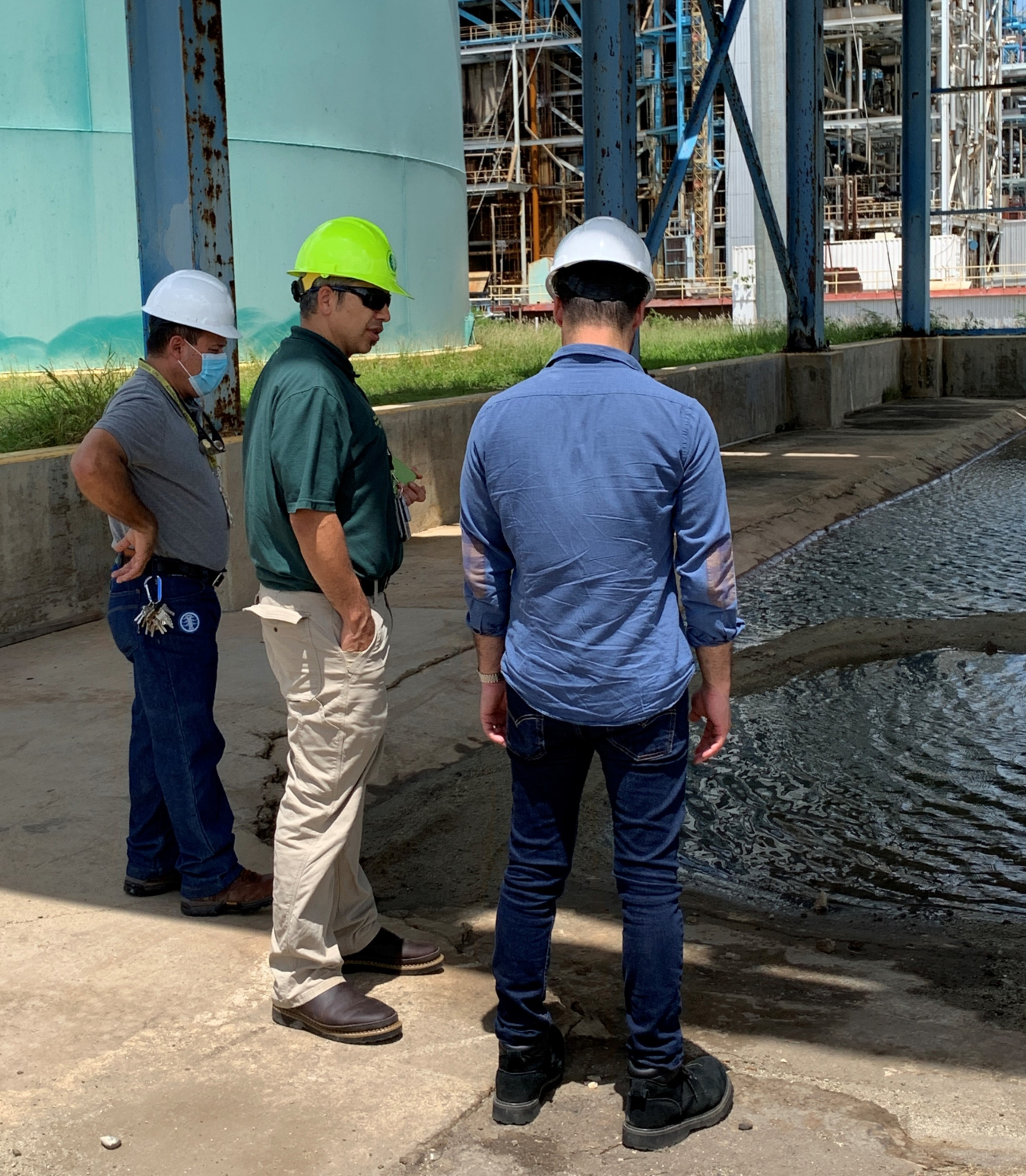 Workers surveying damage in Puerto Rico