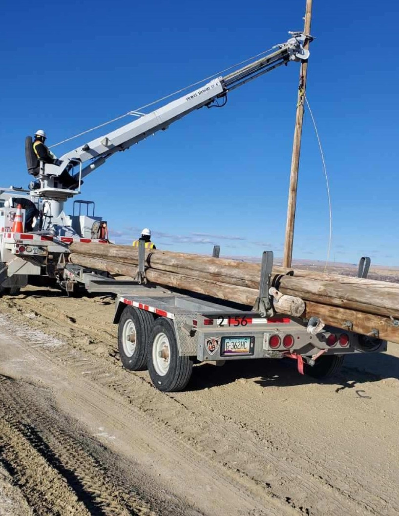 Navajo Tribal Utility Authority remove power poles