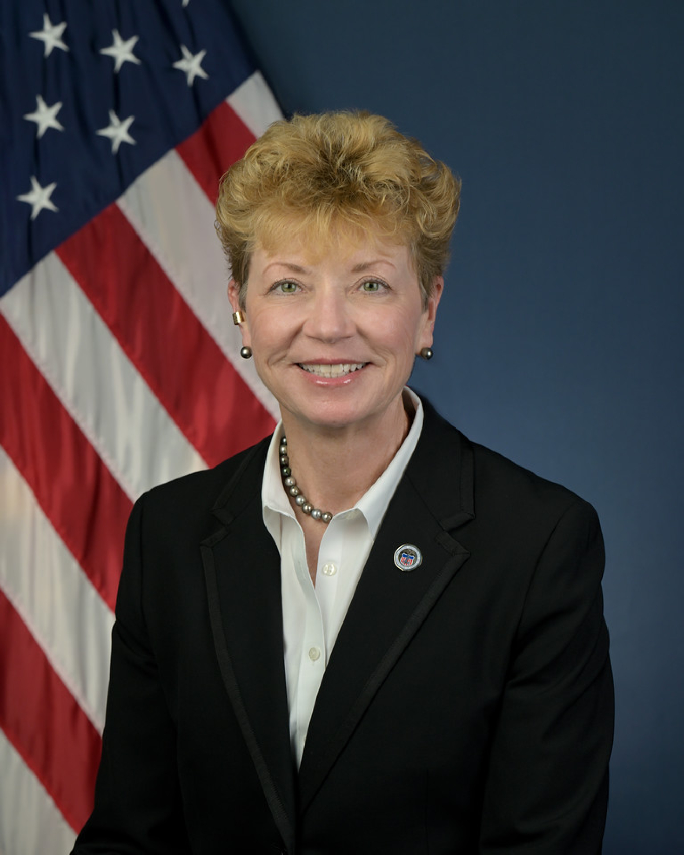 Ann Phillips in uniform smiling at the camera. 