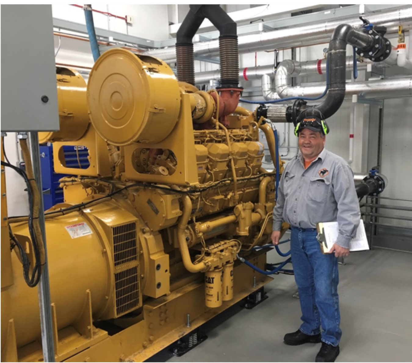 A generator at left with an operations manager at right.