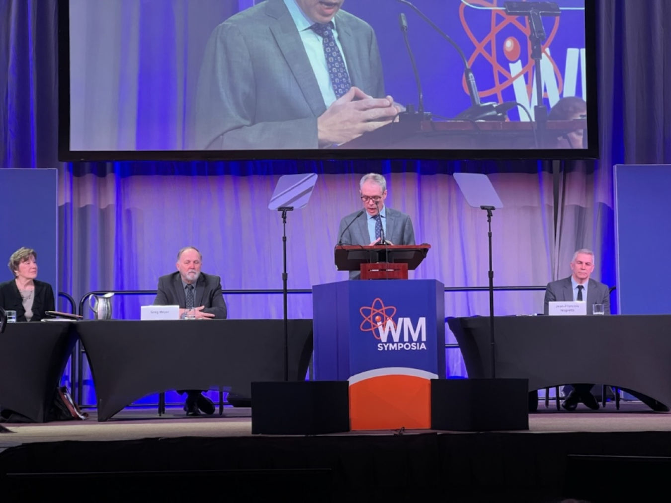 EM Senior Advisor William "Ike" White speaks to the audience at the 2023 Waste Management Symposia during his address Monday.