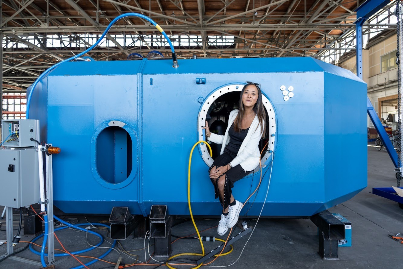 woman sitting on wave energy device