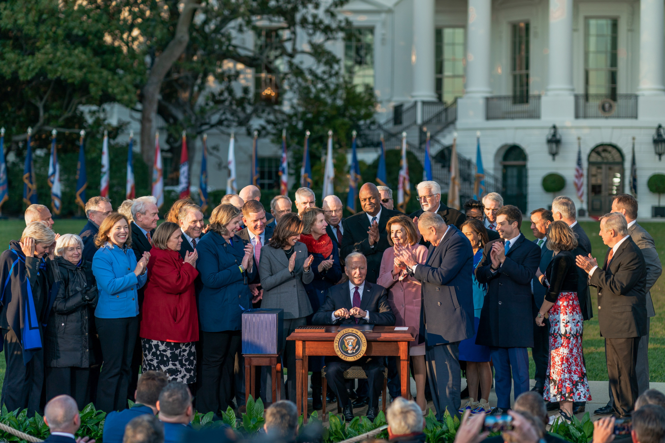 President Biden signing the Bipartisan Infrastructure Law