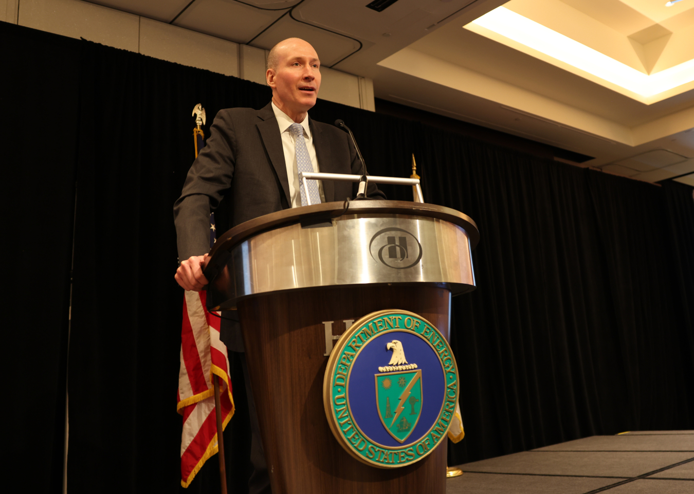 Deputy Energy Secretary David Turk addresses DOE employees and others during a ceremony last week in which he presented EM with two Project Management Awards honoring the cleanup program for exceptional results in complex projects.