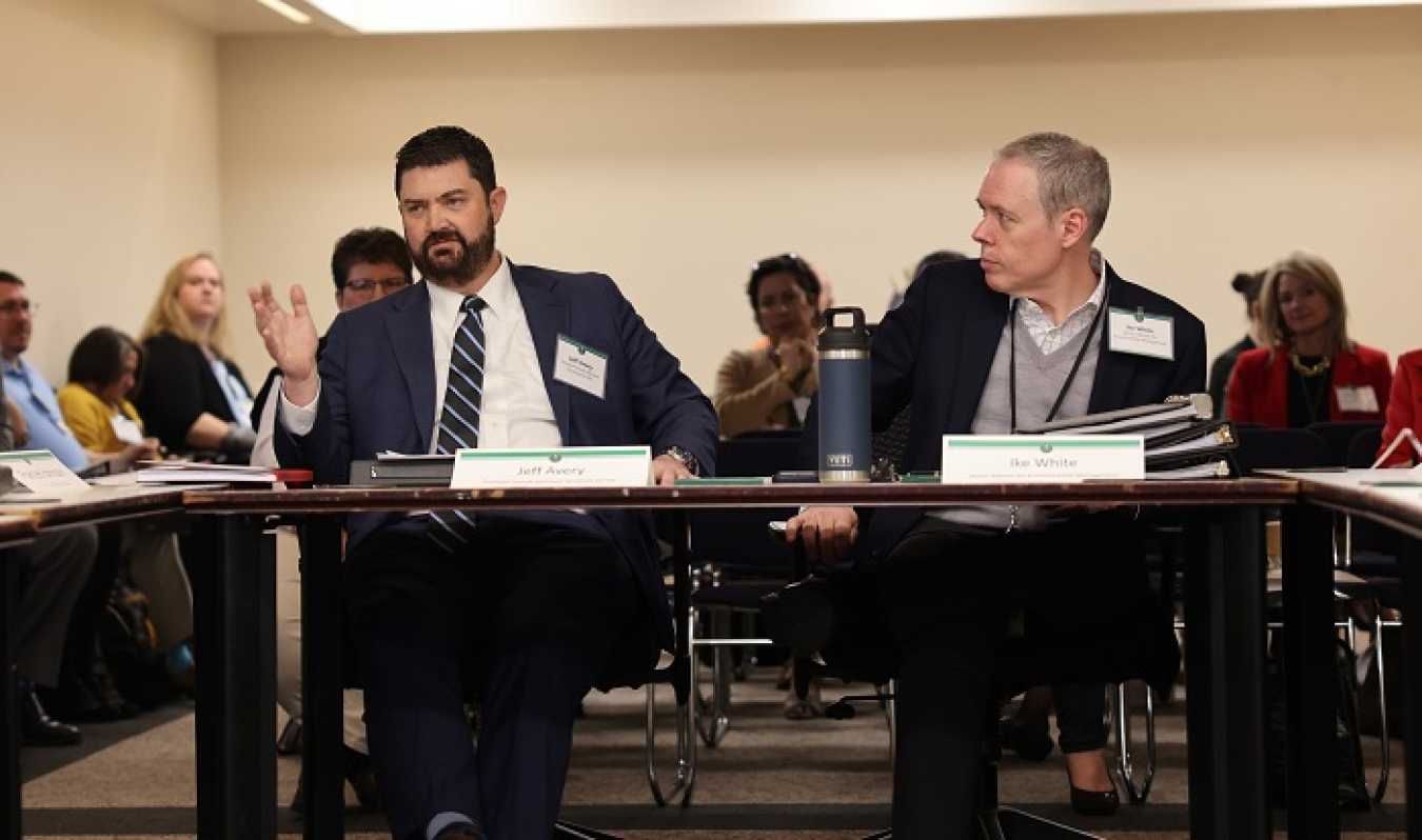EM Principal Deputy Assistant Secretary Jeff Avery, left, speaks during the recent EM Site-Specific Advisory Board National Chairs meeting as EM Senior Advisor William “Ike” White listens.