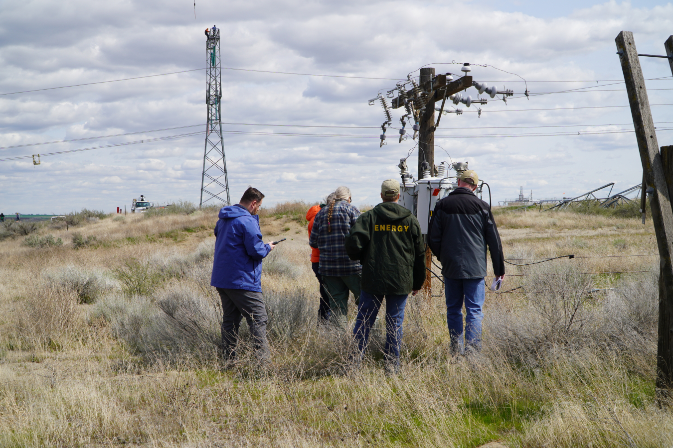 DOE’s Catastrophic Incident Response Team members use satellite phones to communicate with drone operators during recent training at Hanford’s Volpentest HAMMER Federal Training Center, managed by EM contractor Hanford Mission Integration Solutions.