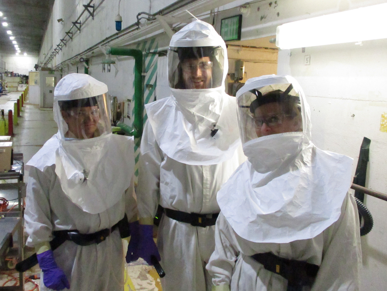 From left, Travis Roos, Brad Scott and Piper Vucelick visit T Plant during their rotations as part of EM contractor Central Plateau Cleanup Company’s health physics training program on the Hanford Site.