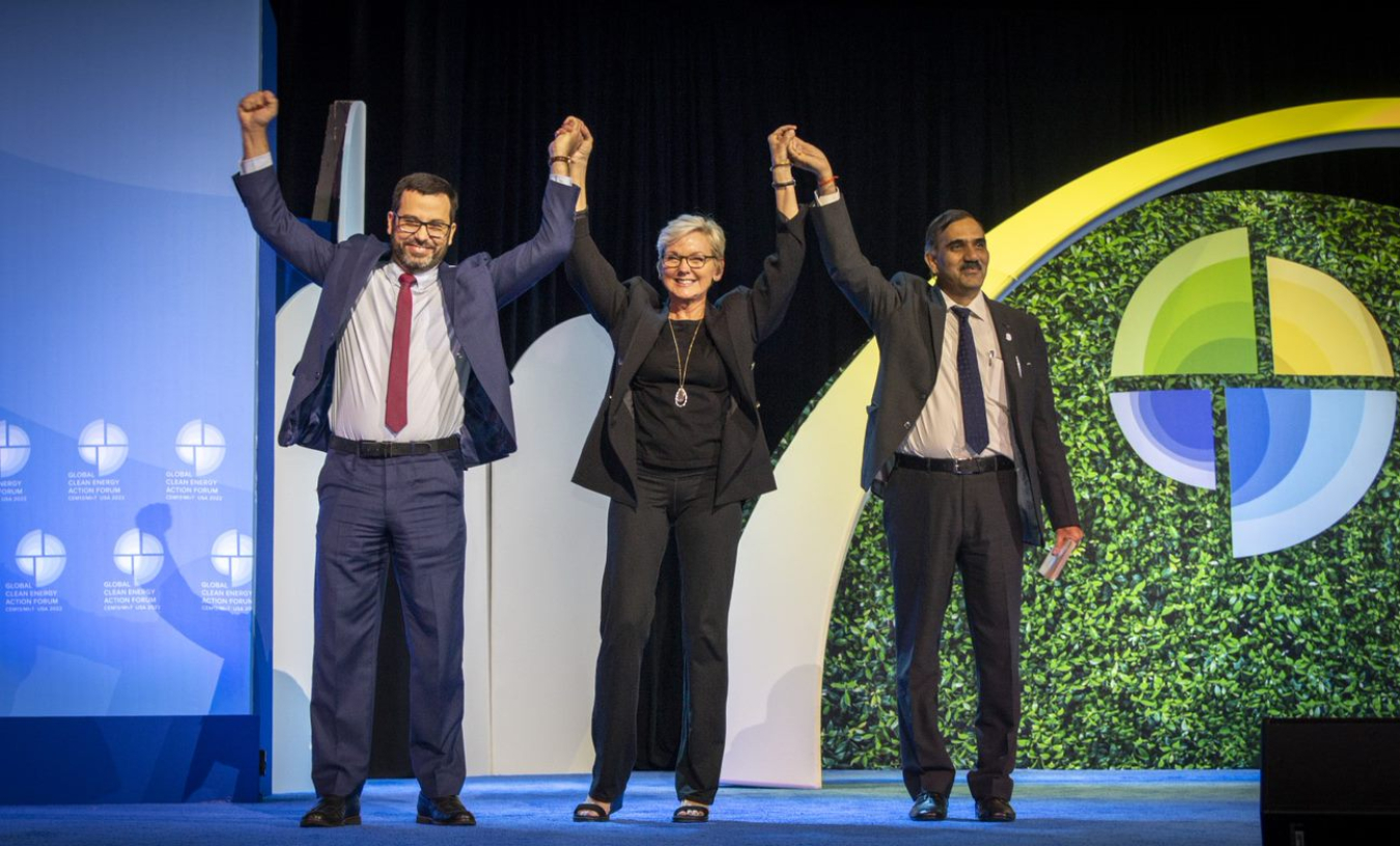 U.S. Secretary of Energy Jennifer Granholm (center) celebrates the closing of the Global Clean Energy Action Forum in Pittsburgh with , Indian Ministry of Ministry of New and Renewable Energy Director General Abhay Bakre (right) and Brazil's former , Secretary of Energy Planning and Development José Guilherme de Lara Resende in September 2022.
