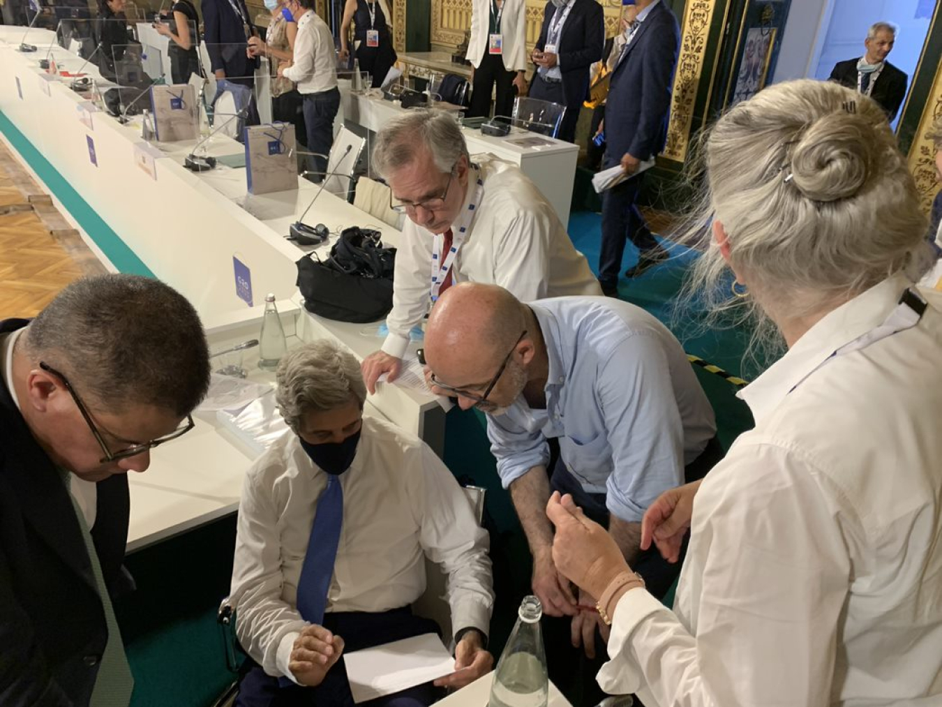 Assistant Secretary for International Affairs Andrew Light (far back) and Special Presidential Envoy for Climate John Kerry (sitting, center) meet with their Italian and U.K. counterparts during G20 Climate and Energy negotiations in Italy in July 2021.