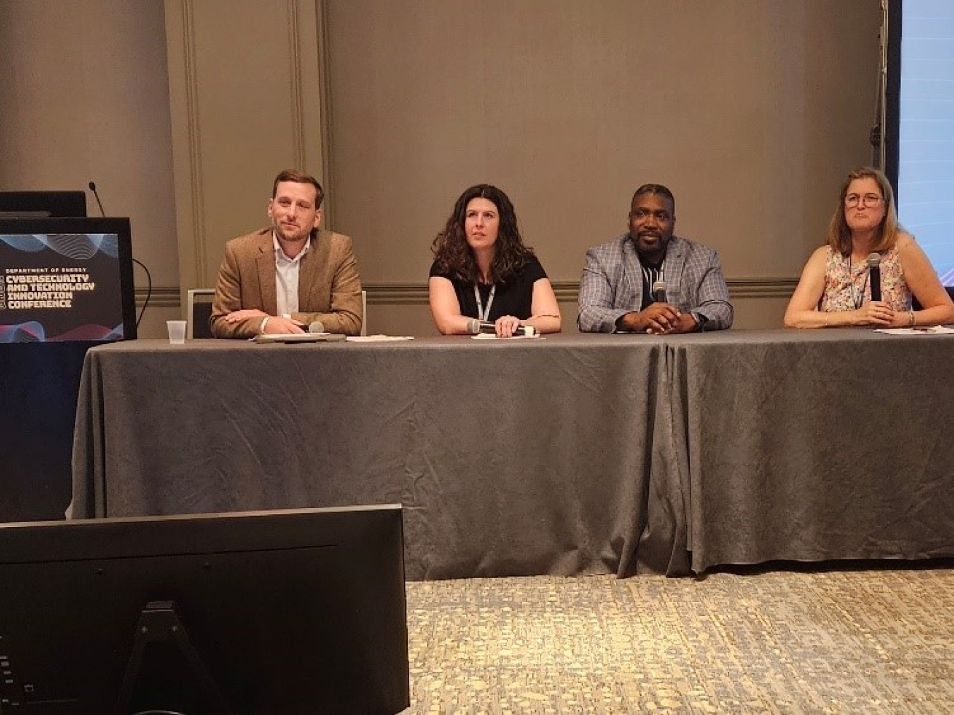 NNSA Deputy Associate Administrator for Information Management and Chief Information Officer, Steven McAndrews, (far left) and NNSA data scientist, Erica Vosseller, (2nd from left) participate in a panel on “Machine Learning, Artificial Intelligence, and the Future Workforce.”