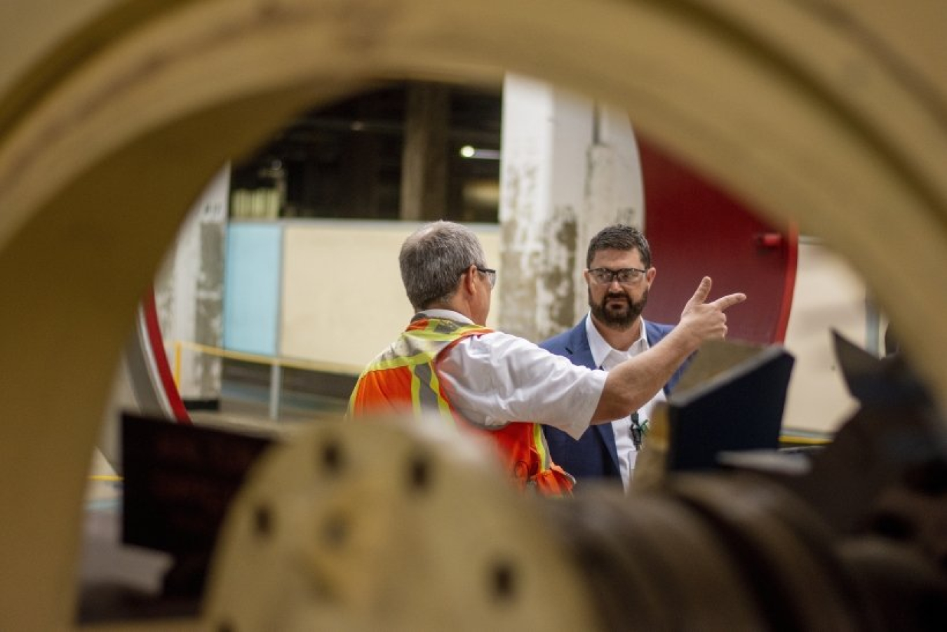 Brad Pont, at left, Safety Systems Oversight for DOE Portsmouth/Paducah Project Office, leads a tour of a display cell in the C-333 Process Building with EM Principal Deputy Assistant Secretary Jeff Avery at the Paducah Site.