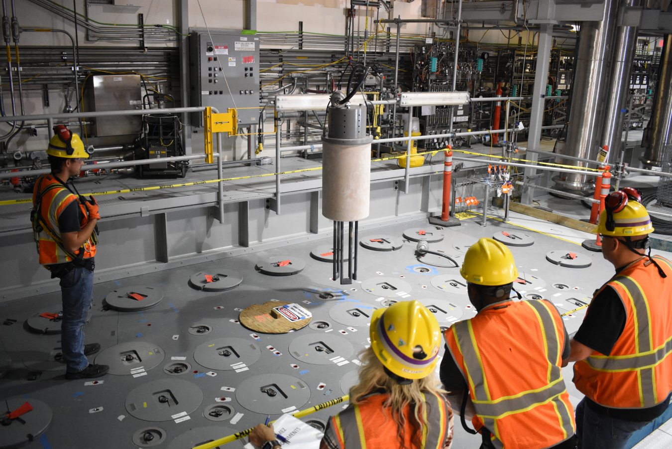 Workers with the Waste Treatment and Immobilization Plant tour and learn about Melter 1 at the Low-Activity Waste Facility on the Hanford Site. Tank waste will be mixed with glass-forming materials and heated in melters in a process known as vitrification, or immobilization in glass.