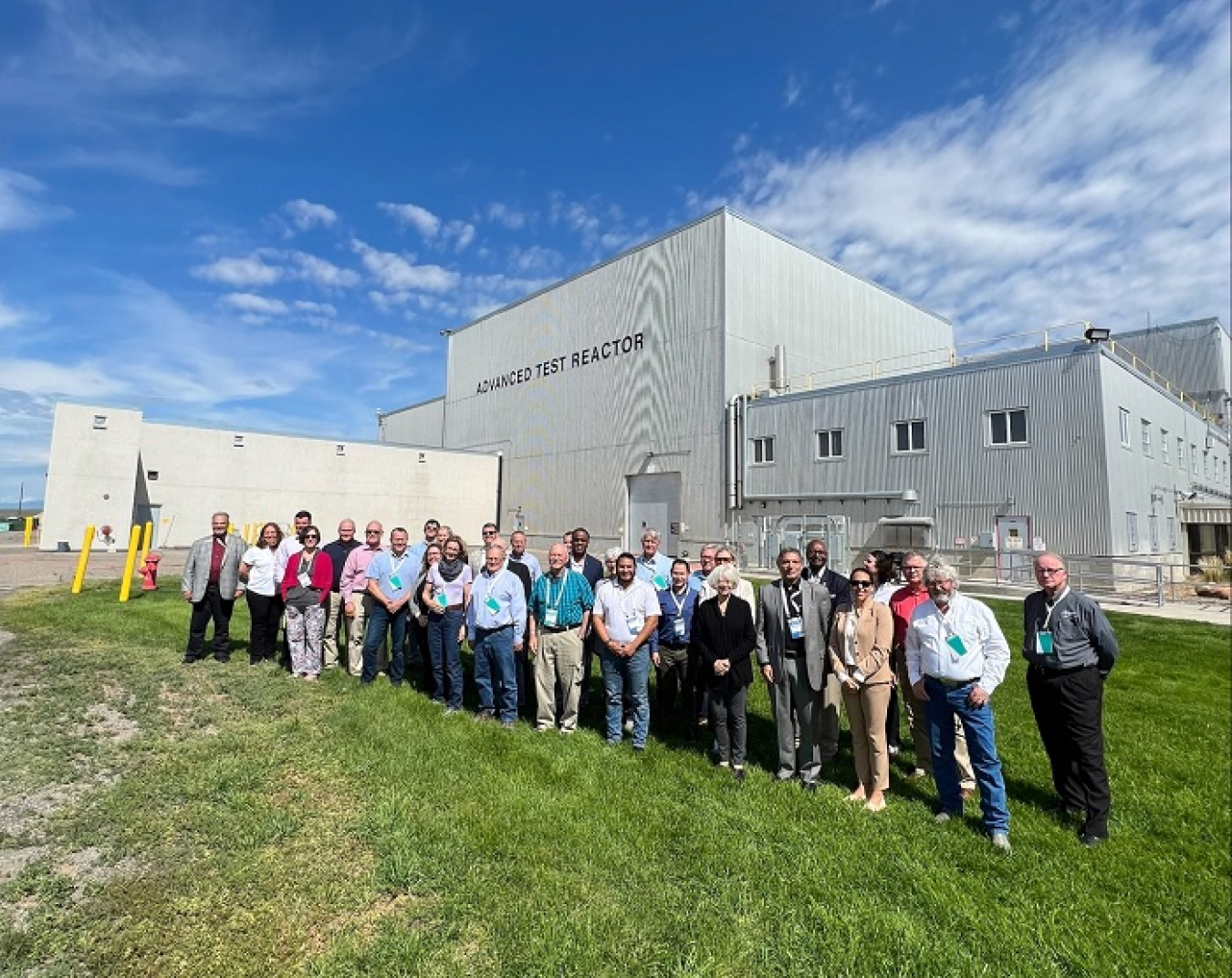 Participants in the recent National Conference of State Legislatures Nuclear Legislative Working Group meeting pause for a photo outside the Advanced Test Reactor while on a tour of the Idaho National Laboratory Site and facilities