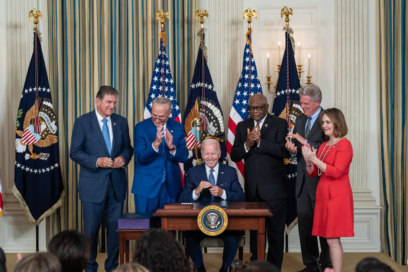 President Biden signing the IRA