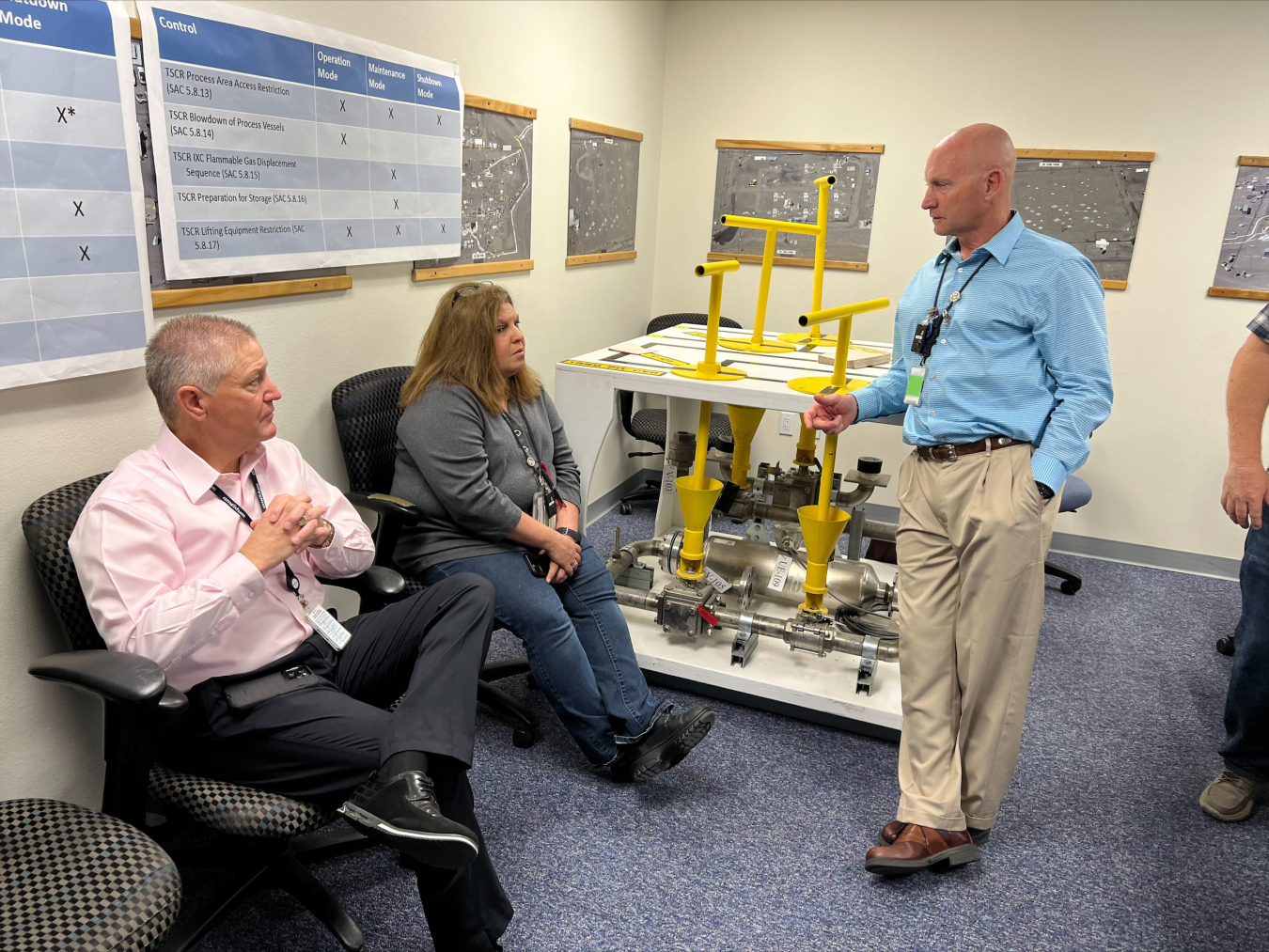 Washington River Protection Solutions President and Project Manager Wes Bryan, left, Production Operations Manager Monica Kembel, and AZ Farm area manager Dave Strasser were among the executive leadership and frontline managers who participated in recent operations safety culture courses. Hanford’s radioactive and chemical waste-storage tanks are in letter-designated underground fields called tank farms.