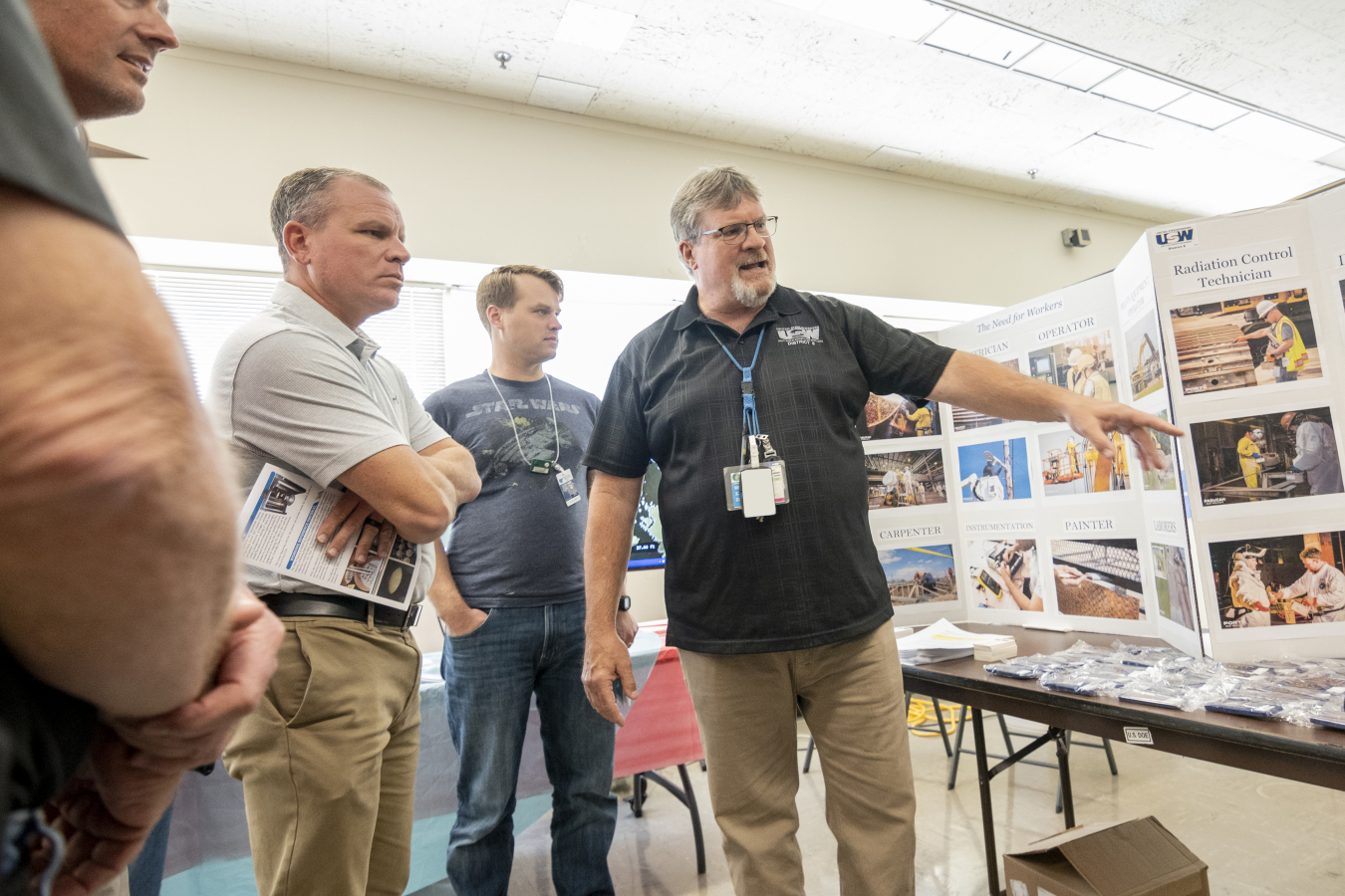 United Steel Workers (USW) Vice President Brad Berry, at right, defines the work USW and field personnel perform to support the cleanup mission at the Paducah Site.