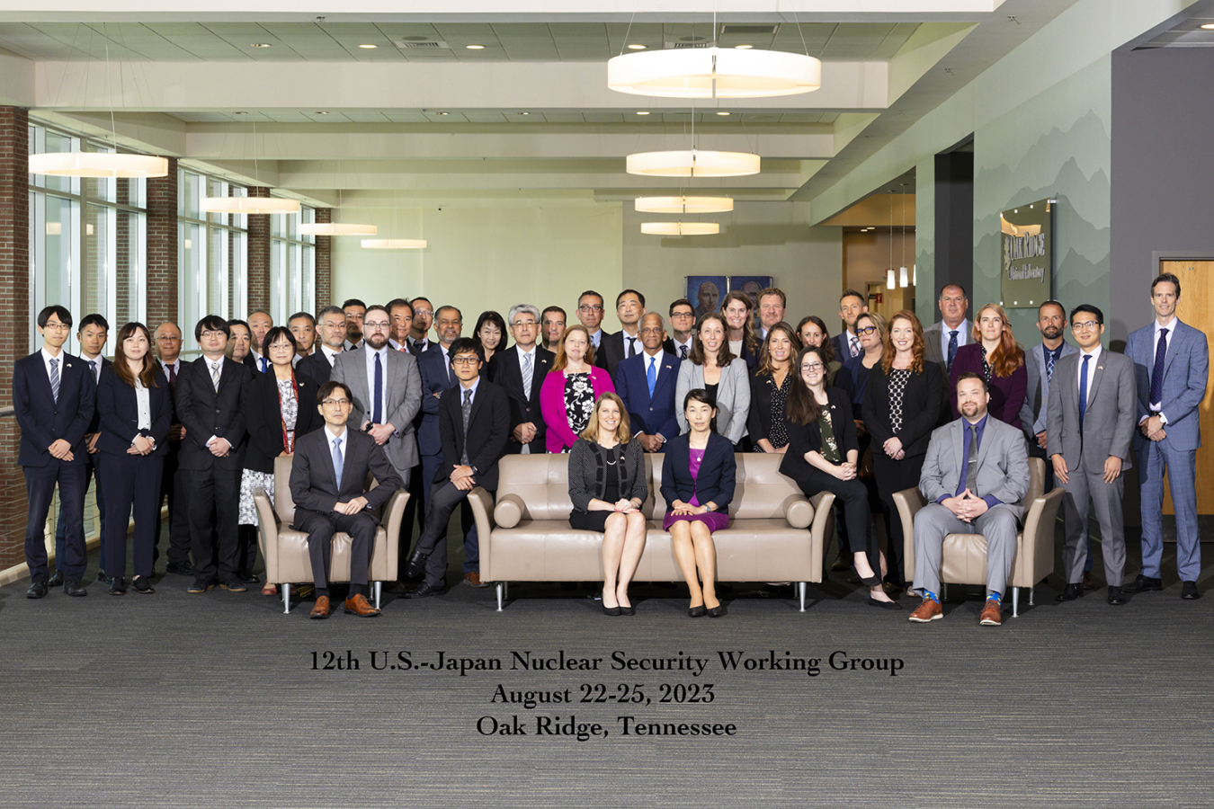 A large group of people pose for a photo.