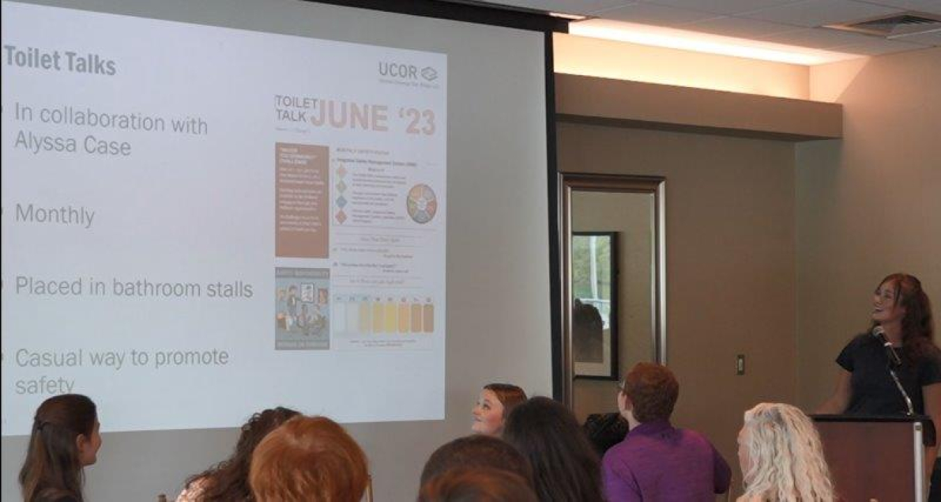 Photo of intern providing a presentation