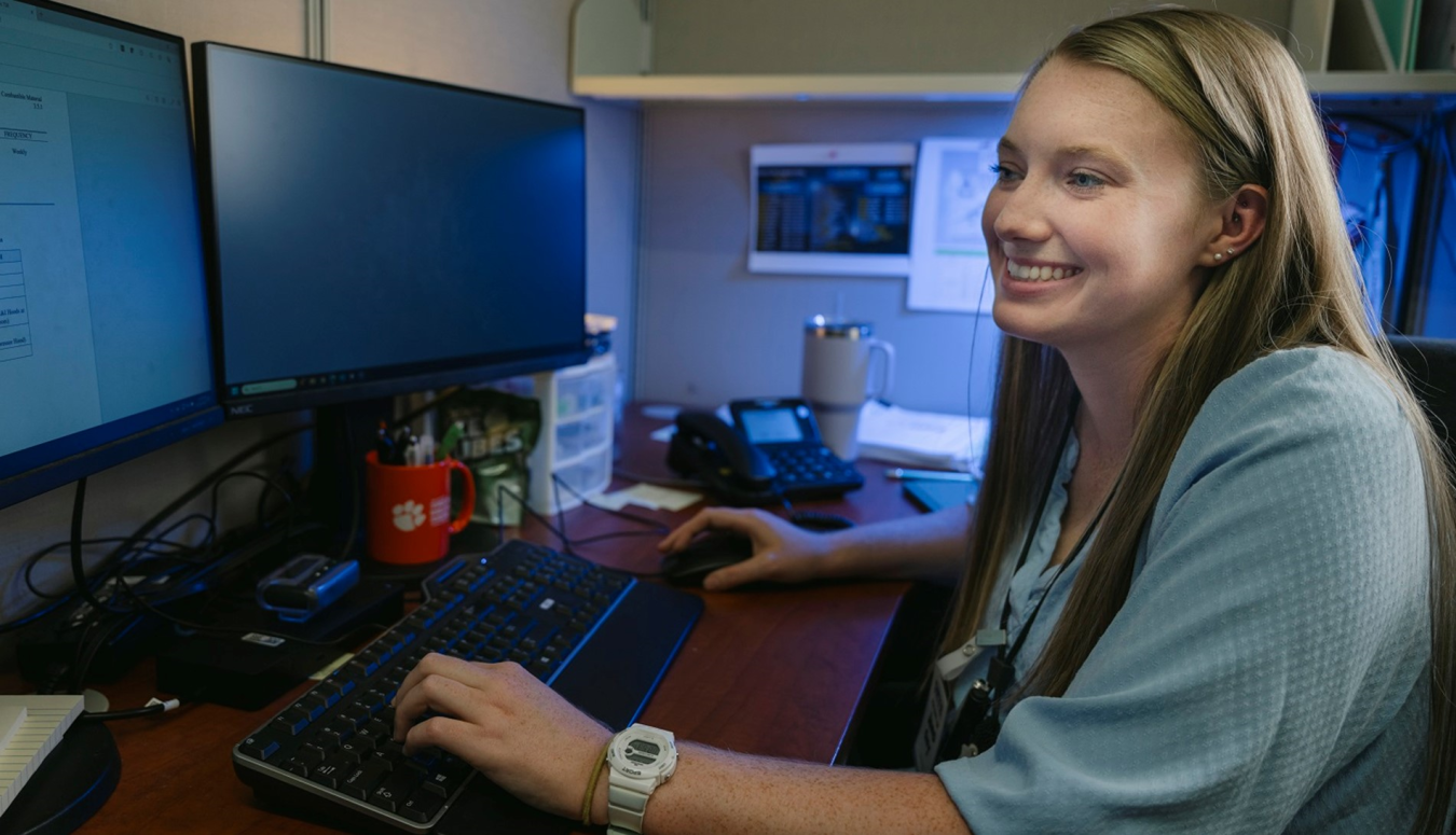 Kathryn McGee working at computer
